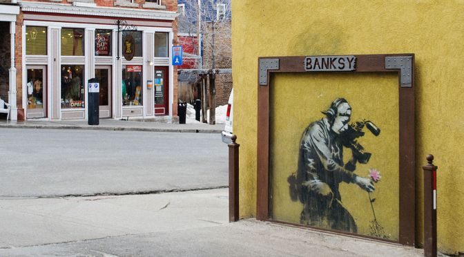 Man Accused of Vandalizing Banksy Images