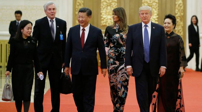 A Secret Service agent tackled a Chinese security official over the nuclear football when Trump visited China